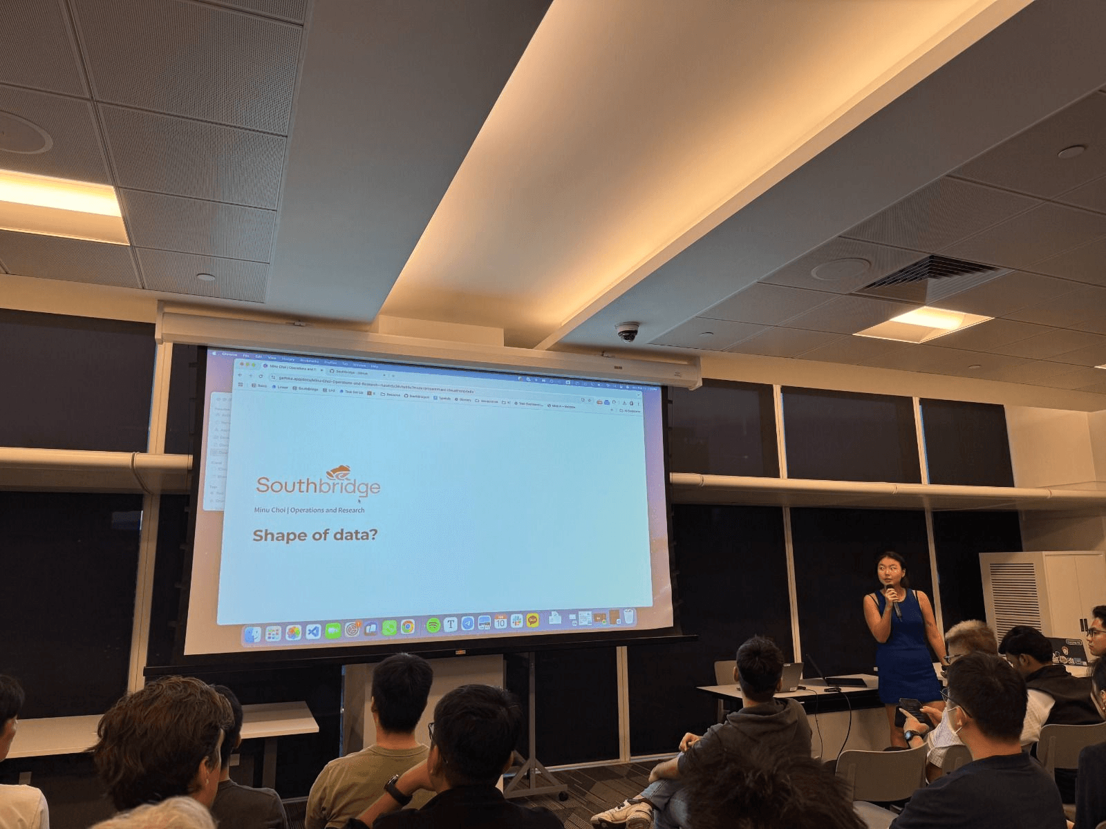 Minu presenting 'Shape of data?' at the Singapore AI Showcase, February 2025.