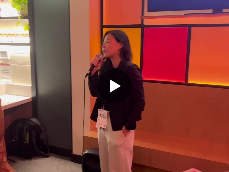 Minu giving her small-models lightning talk in New York